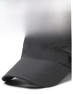 Detail of reinforced brim and metallic logo on a quick-dry black outdoor sun hat
