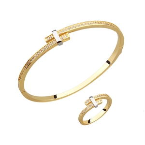 Elegant gold and silver plated copper jewelry set with zircon crystals and T-design