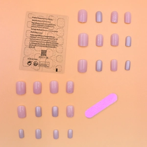 Pink and purple gradient press-on nail kit with 24 false nails and glue stickers