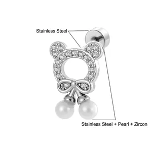 Hollow bear cartilage earring with bow, zircon accents and hanging white pearls