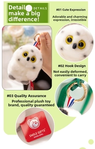 Detail of white owl plush keychain featuring golden metal ring and soft spotted texture