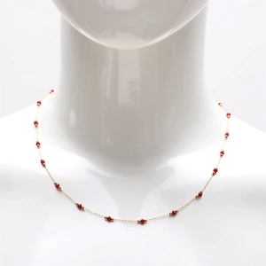 Minimalist 18K gold-plated stainless steel necklace with delicate red crystal beads