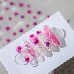 Pink and purple rose nail stickers with marble patterns and silver glitter accents