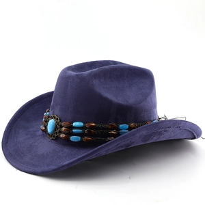 Detail of blue suede cowboy hat featuring woven band and turquoise stone bead