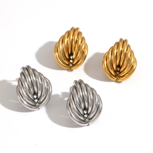 Twisted wire teardrop earrings in gold and silver finish on a clean white background