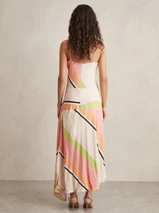Sleeveless maxi dress with colorful geometric stripes and open back for summer vacation