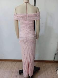 Detail of the back zipper and floral lace texture on this elegant pink off-shoulder gown