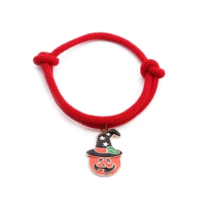 Adjustable red rope bracelet with Halloween wizard hat pumpkin charm on white background