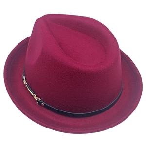 Classic wine red wool felt fedora hat with black band and gold buckle on white background
