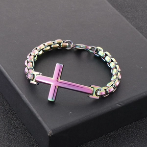 Detail of cross bracelet with iridescent gradient finish and industrial box chain links
