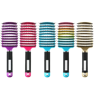 Curved boar bristle vent brushes in purple, pink, blue, and gold with non-slip handles
