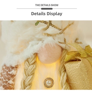 Macro detail of lighted Christmas gnome with white faux fur hat and golden sequins
