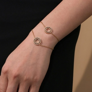 Elegant gold double-layered bracelet with circular zircon pendants for women
