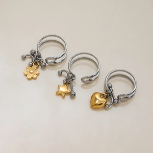 Two-tone 18K gold and silver stainless steel rings with flower, star and heart charms