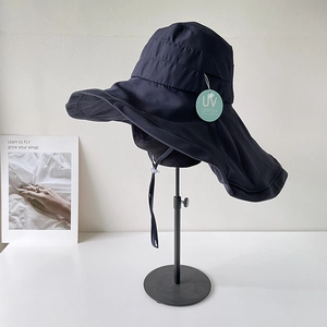 UPF50+ sun hat detail showing wide brim and long neck flap for UV protection