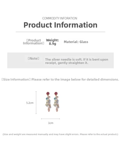 Detailed specs of colorful tassel earrings with glass crystals and silver needles