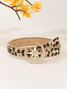 Leopard print belt detail featuring a gold star and moon rhinestone buckle on faux fur