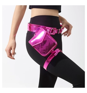 Detail showing pink reflective PU leather waist bag with adjustable thigh strap and metal buckle