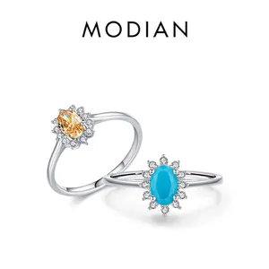 Elegant s925 silver rings with turquoise and orange gemstones in floral halo design