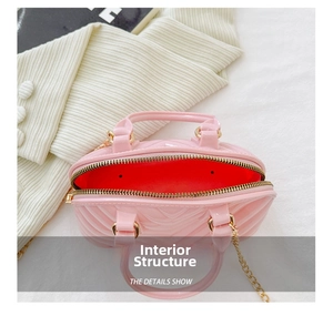 Internal structure of the pink jelly handbag showing spacious space and zipper closure