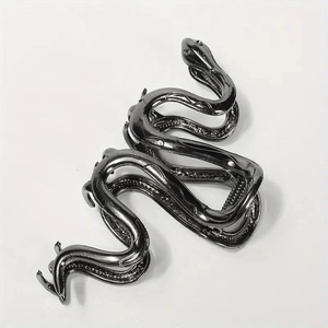 Gothic snake-shaped metal hair claw clip in gun black finish with realistic scale texture