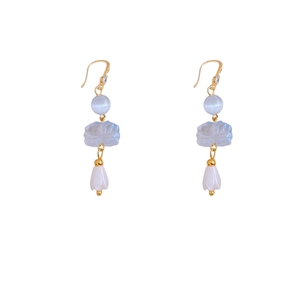 Elegant gold lotus zircon earrings featuring blue cat eye stone and tulip pendant charms