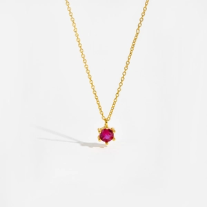Detailed view of s925 silver golden necklace featuring a rose red zircon in a 6-prong setting