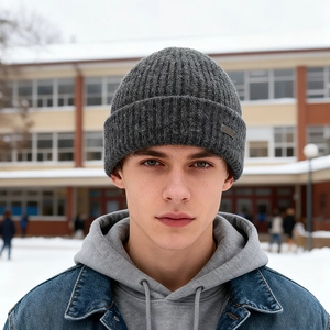 Dark grey ribbed knit beanie for winter outdoor warmth, minimalist unisex style