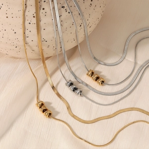 Minimalist double layer snake chain necklace with gold and silver bead pendants