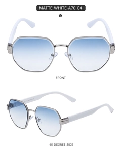 Detail view of matte white square sunglasses with blue gradient lenses and metal hinges