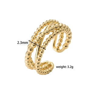Detail view of golden triple-layered beaded ring with 2.3mm thickness and 3.2g weight