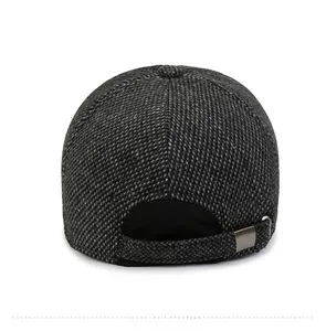 Detail view of the adjustable rear strap and silver buckle on a men's wool baseball cap