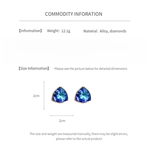 Fiche technique des boucles d'oreilles triangle bleues avec finitions dorées et argent