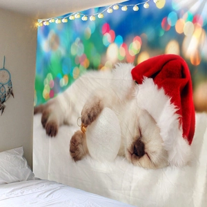 Detail of Christmas tapestry featuring a sleeping cat with festive bokeh lights on bedroom wall