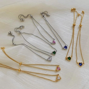 Adjustable stainless steel heart bracelet with colorful cubic zirconia in gold and silver