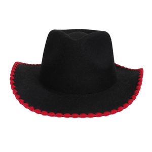 Detail of black wool felt cowboy hat with contrasting red decorative wavy edge stitching