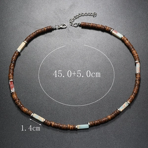 Detail of ethnic beaded necklace featuring brown coconut wood beads and colorful stones