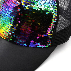 Detail of colorful sequins on baseball cap with breathable black mesh and stitch texture