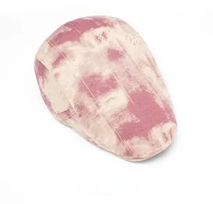 Detail of vintage pink tie-dye cotton beret hat with marble texture and breathable fabric