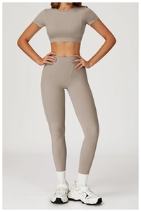 Detail of high-waist taupe yoga set featuring a wide waistband for tummy control