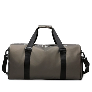 Large gray waterproof travel fitness bag with shoulder strap and trolley sleeve design