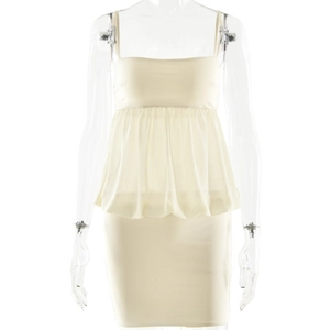 Detail of beige sleeveless dress featuring tiered ruffles and slim fit hip design
