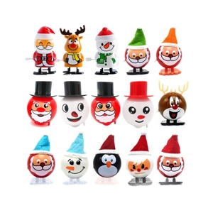 Set of 15 assorted wind-up Christmas toys including Santa, snowmen, and reindeer figurines