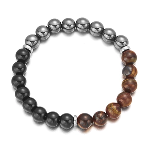 Macro detail of natural Tiger Eye and Hematite beaded bracelet with silver spacers