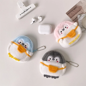 Detailed view of plush penguin coin purses in blue, pink, and grey with silver bead chains