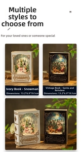 Close-up of vintage book-shaped Christmas LED lantern with snowman and elk landscape