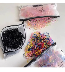 Elastische Haarbänder im mattierten Beutel in Schwarz, Bunt und Glitzer-Stilen