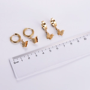 Boucles d'oreilles créoles papillon en acier inoxydable doré 18K avec fini mat