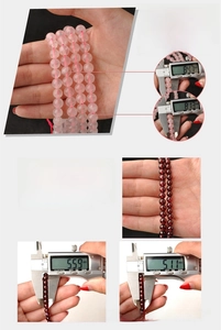 Macro view of 5mm natural pink quartz beads with digital caliper measuring diameter