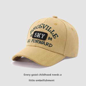 Detailed view of beige cotton baseball cap featuring high-quality SKY letter embroidery